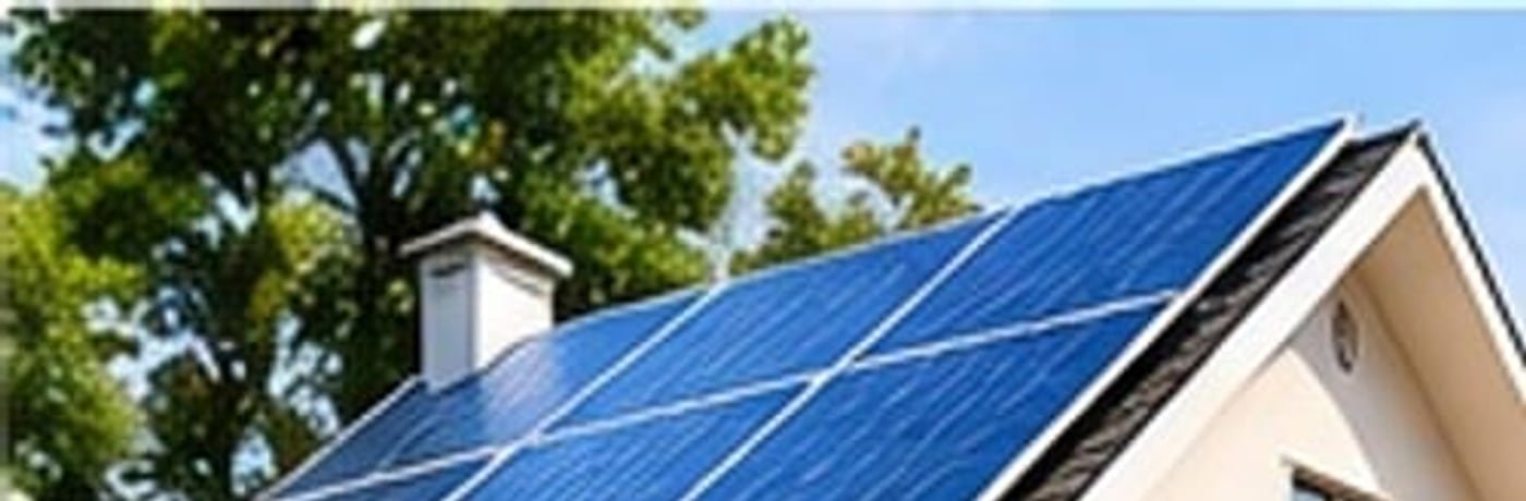 Rooftop solar panels overlooking Bhubaneswar at sunset